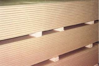 Photograph of stacks of high-quality wallboard made from gypsum, a coal byproduct