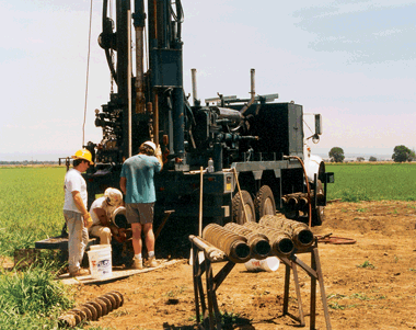 Figure 20. Drilling and installing a new monitoring well in the rice-growing region of the Sacramento Valley. 