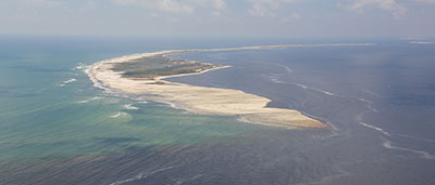 Oblique aerial photograph looking west along Petit Bois Island, September, 2012; link to report