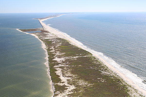 Oblique aerial photograph looking west along Dauphin Island capturing the well-defined breakwater, September 2015.