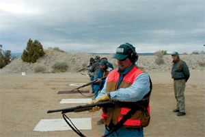 photo of USGS employee with firearm on shooting range