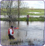 USGS hydrologic technician measuring discharge