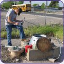 USGS hydrologic technician collecting ground-water data