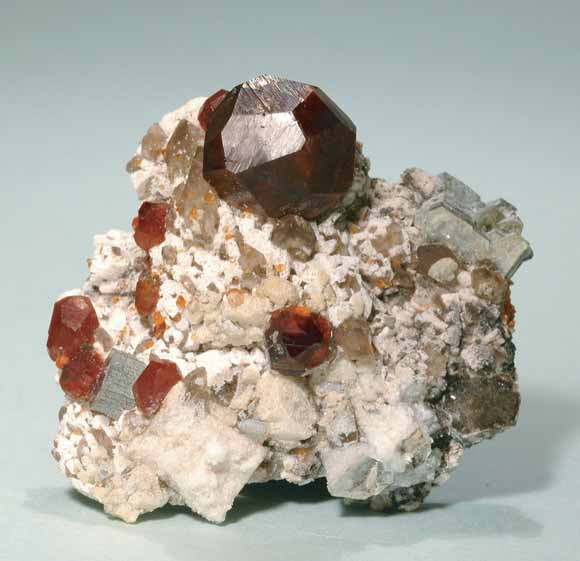 close-up photograph of garnets in hand specimen