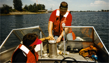 Figure 2. USGS hydrologists prepare to deploy a semipermeable-membrane sampling device in the Columbia River.