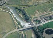 Picture of wastewater effluent entering river.