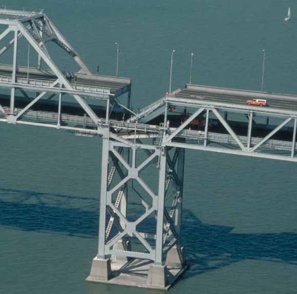 photo of collapsed section of the Bay Bridge taken by John Nakata from a low-flying small plane piloted by Bill Updegrove