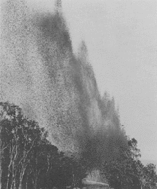 Photograph of lava and volcanic debris blocking roads during the 
1959 eruption of Kilauea Iki Volcano