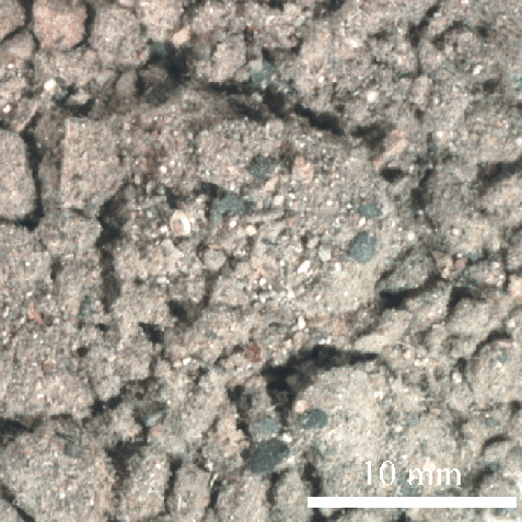 Optical image of dust and debris collected 0.3 km from
	ground zero (sample WTC01-27)