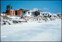 Powerful storms such as Hurricane Eloise, erode beaches and destroy homes like these near Panama City, Florida that were built too close to the shore.