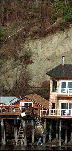 Close-up photo of one of the Salmon Beach houses damaged by a landslide
