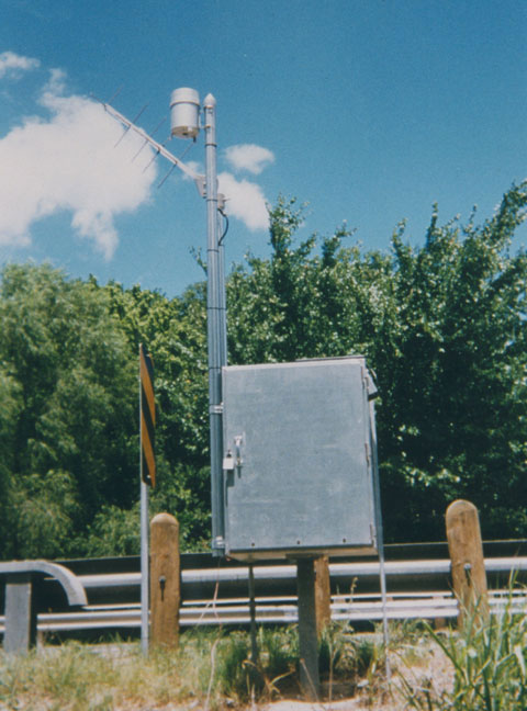 Figure 11: USGS Photo 11 - Modern streamflow-gaging station with antenna used for transmitting data. 