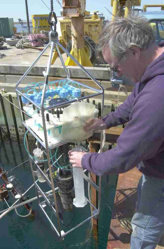 Figure 7. Collection and volume measurements of water pumped through the WTS-Tr system during testing procedures at the WHOI dock facility.