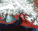 Figure 7-2. A Landsat 2 Multispectral Scanner false-color composite image of the Malaspina Glacier (piedmont outlet glacier), tidewater Hubbard Glacier, and other glaciers in the St. Elias Mountains, Alaska, 24 August 1979; see figure 144, p. K160, in Glaciers of Alaska (https://pubs.usgs.gov/pp/p1386k). 