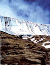 Figure 8-2b. Two views of the receding margin of the Quelccaya ice cap, Perú’s largest glacier and the Earth’s largest tropical ice cap. The margin of the ice cap was photographed from the same camera station in 2002. Photographs by Lonnie G. Thompson, Byrd Polar Research Center, The Ohio State University, Columbus, Ohio. 
