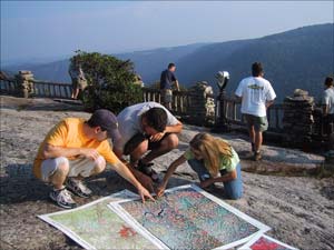 Photograph of students in a remote sensing class at West Virginia University, an AmericaView member institution, field checking aerial and satellite image interpretations at Coopers Rock State Forest, West Virginia
