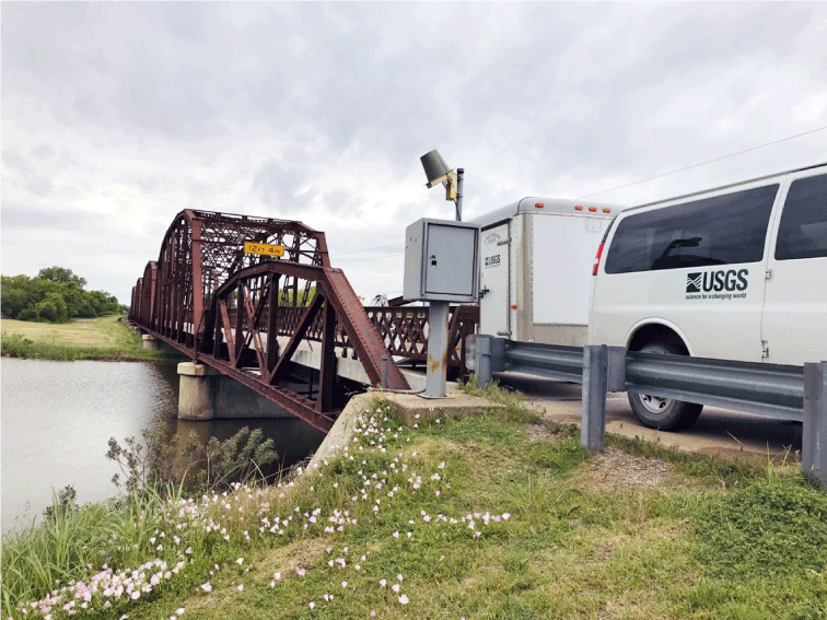 Figure 5. Photograph showing U.S. Geological Survey streamgage 07240200 on the North
                        Canadian River at Highway 66 at Oklahoma City, Oklahoma. Photograph by T. Tibbets,
                        U.S. Geological Survey, May 2020.