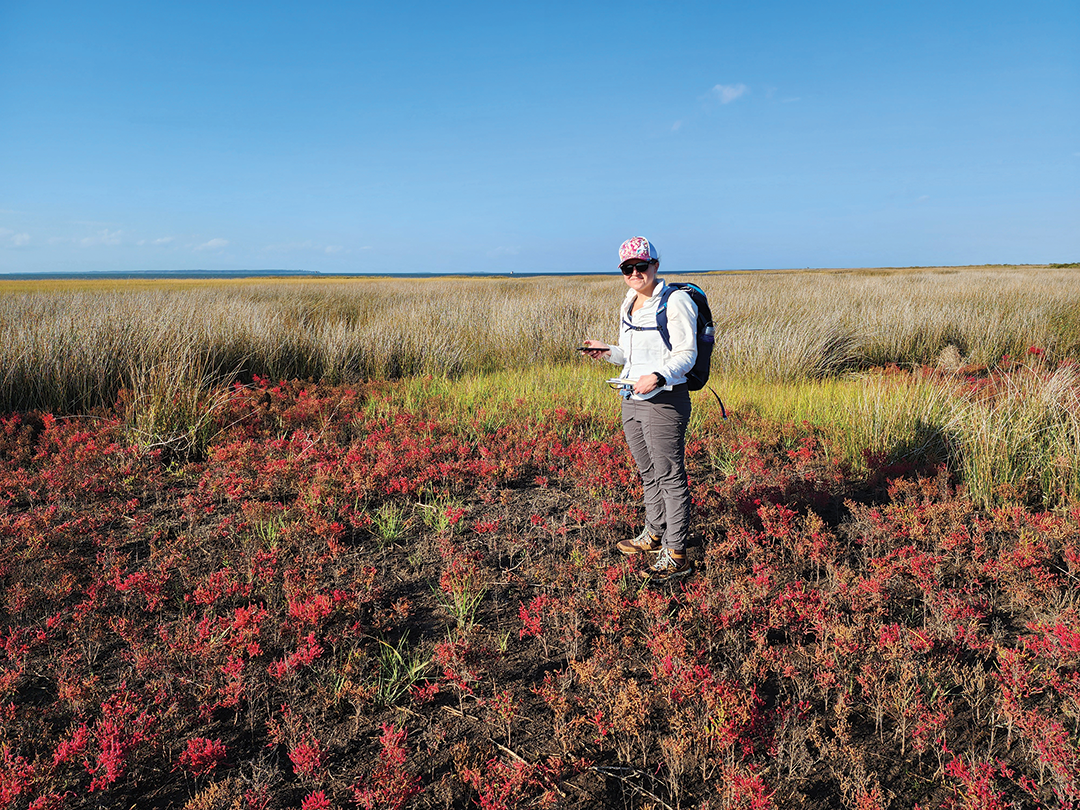 Sara Zeigler mapping vegetation at North Core Banks, Cape Lookout National Seashore
                        in North Carolina.