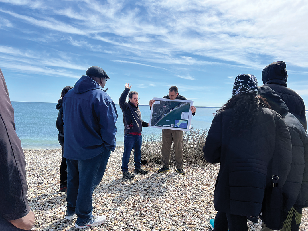 U.S. Geological Survey scientists Seth Ackerman and Alfredo Aretxabaleta discussing
                           coastal processes and how storms and sea level rise can impact local municipal infrastructure
                           with a group of undergraduate students and their faculty advisor from Saint Augustine’s
                           University—a private historically Black college in Raleigh, North Carolina. The students
                           and advisor also received a tour of the laboratories at the Woods Hole Coastal and
                           Marine Science Center.