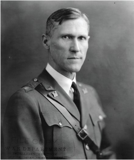 Portrait image a of a clean-shaven man in U.S. Army uniform with engineering regiment
insignia.