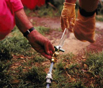 Figure 19. Samples are collected at the well head for randon analysis to prevent possible sample contamination from exposure to the atmosphere.