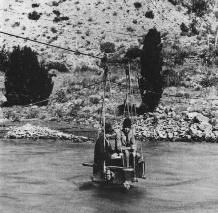 Figure 13. Photo showing an early method of stream gaging, 1890.