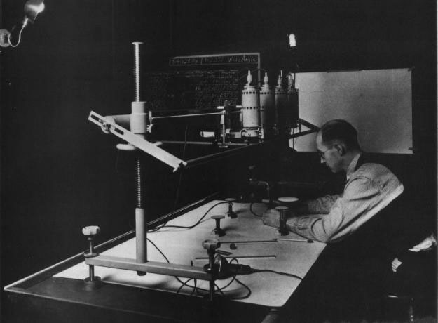 Figure 33. A photo of a Survey topographer using multiplex equipment to prepare a topographic map, 1936.