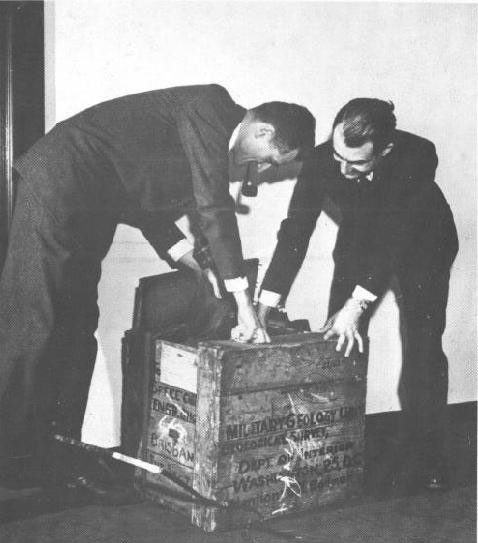 Figure 35. Photo of military geologists opening a box of soil samples from the Southwest Pacific, 1945.