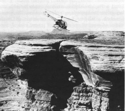Figure 37. Photo of a helicopter landing topographic engineers and equipment for triangulation, 1953.