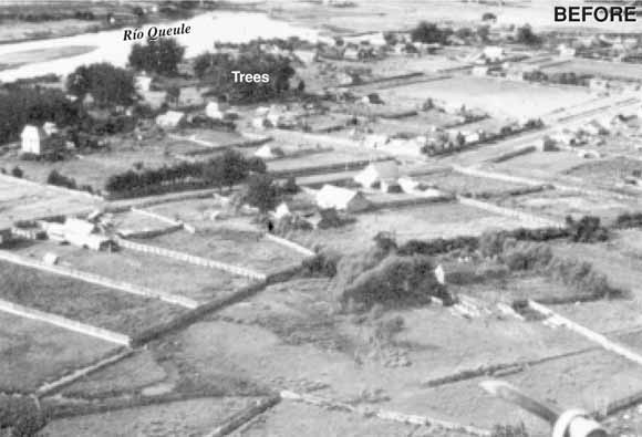 photo of village before damage showing dozens of houses