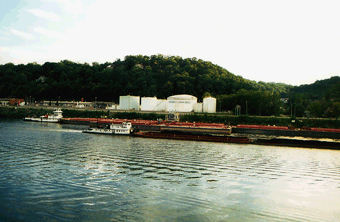 Figure 2. Coal and motor fuel commonly are transported by barge on the Kanawha River, downstream from Kanawha Falls.