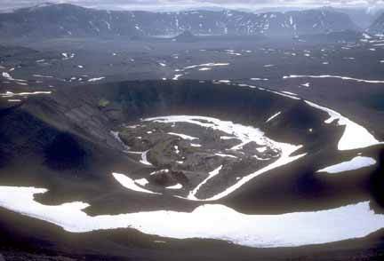 Photograph from air of caldera floor, young lava flow and cone evident on caldera floor