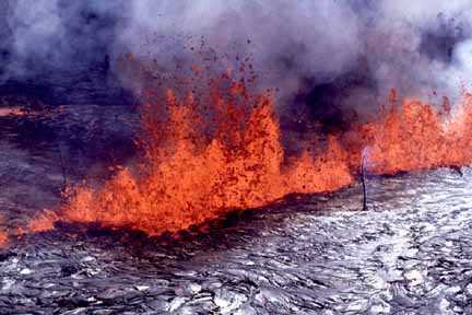 photo 002.  Photo of red-hot lava spurting up out of fissure