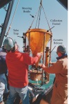 Photograph of funnel-shaped Honjo sediment trap being recovered.
