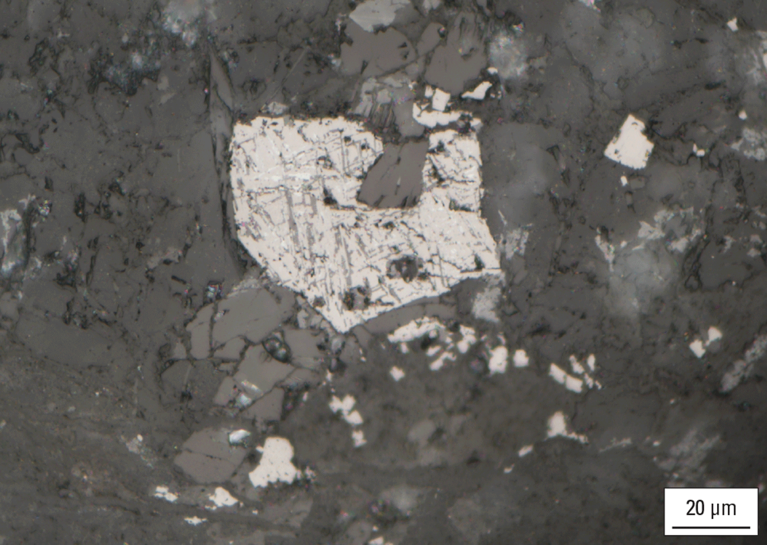 The magnified textures and structures of various minerals are shown.