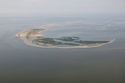 Aerial photograph looking southwest along Breton Island, Louisiana, taken July 2013. Photograph by USGS Coastal and Marine Geology (Morgan and Westphal, 2014). 