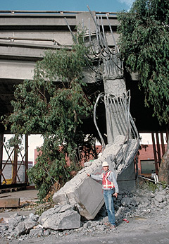photograph showing twisted remnant of Cypress freeway structure