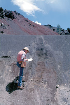 photograph of geologist working at Cinder Cone