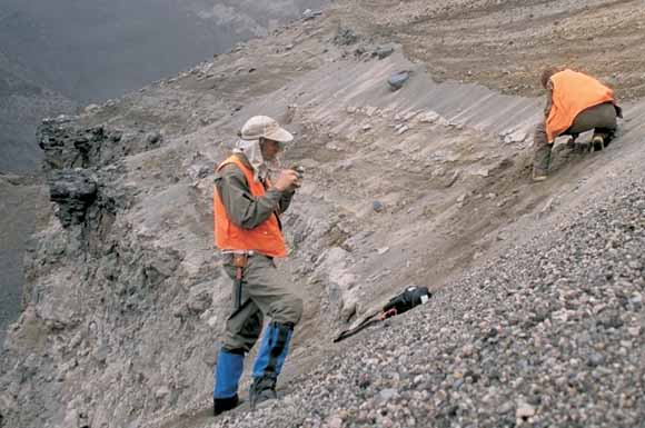 Photograph of geologists on side of volcano