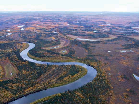 photograph taken from the air of a meandering river