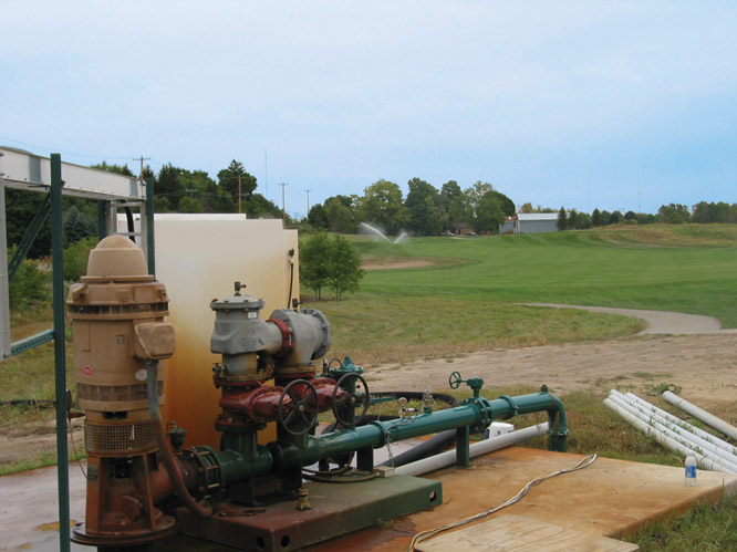 Photograph showing a golf-course irrigation well and water distribution system.