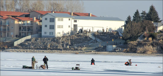 Photograph showing ice fishing on Moses Lake