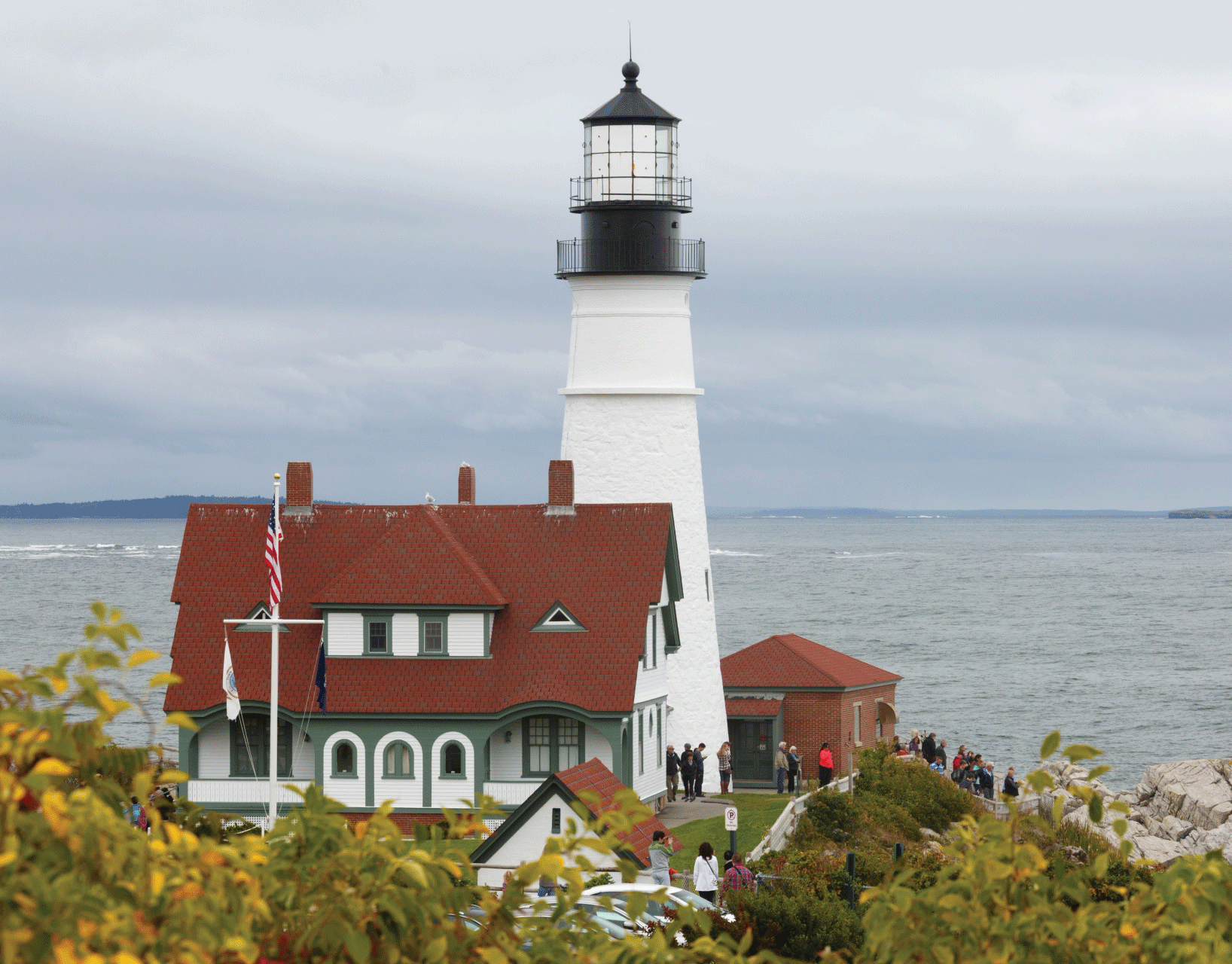 Photograph showing a lighthouse on a Maine coast.