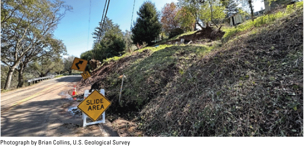 10. Unstable ground is marked as a slide area along a residential street in Berkeley,
                     California.