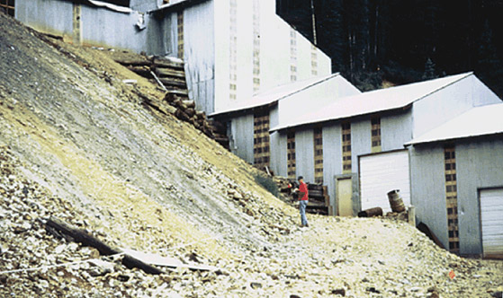 Collecting samples from a mine waste dump.