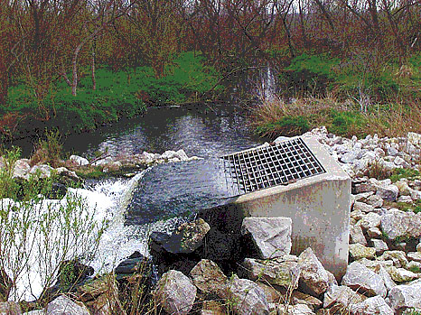 Discharge of water from municipal and industrial waste-water plants.