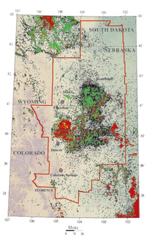 Figure 1.  The Denver Basin Province (red line) of Colorado, Kansas, Nebraska, South Dakota, and Wyoming. Shown are oil (green), gas (red), oil and gas (yellow) and nonproductive (black) wells
