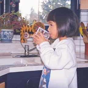 little girl drinking water