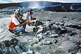 Scientists sampling volcanic gas emissions from Kilauea Volcano, Hawaii