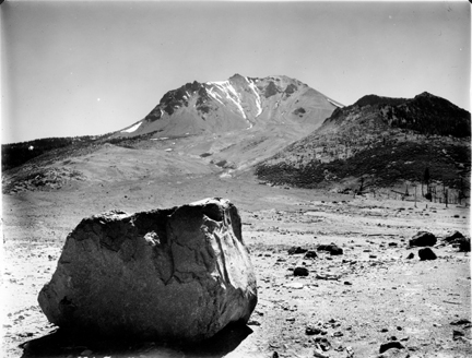 Photograph of Lassen Peak by B.F. Loomis taken in the summer of 1915 shows the additional area devastated by the pyroclastic flow and fluid debris flows of May 22.